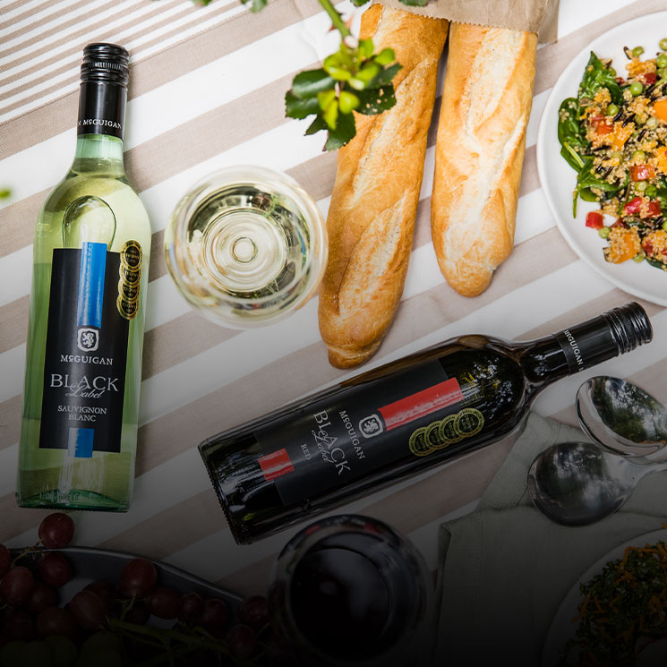 Tempus Two Black range Red and Sauvignon Blanc varietals with salad and baguette
