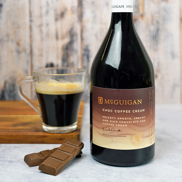 McGuigan Chocolate Coffee cream with a glass of expresso and 2 bards or chocolate