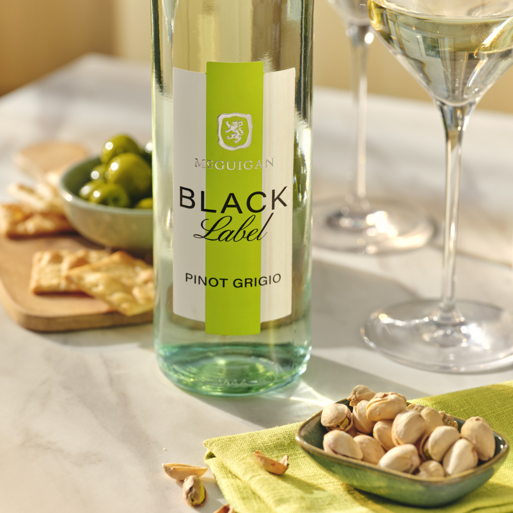 person sitting on a wine barrel