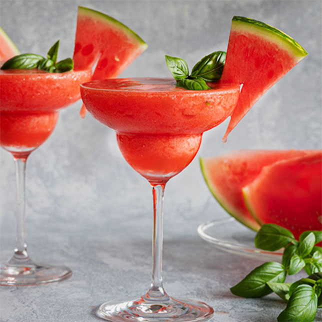 Watermelon Frose cocktail with watermelon garnish